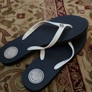 Coach flip flops